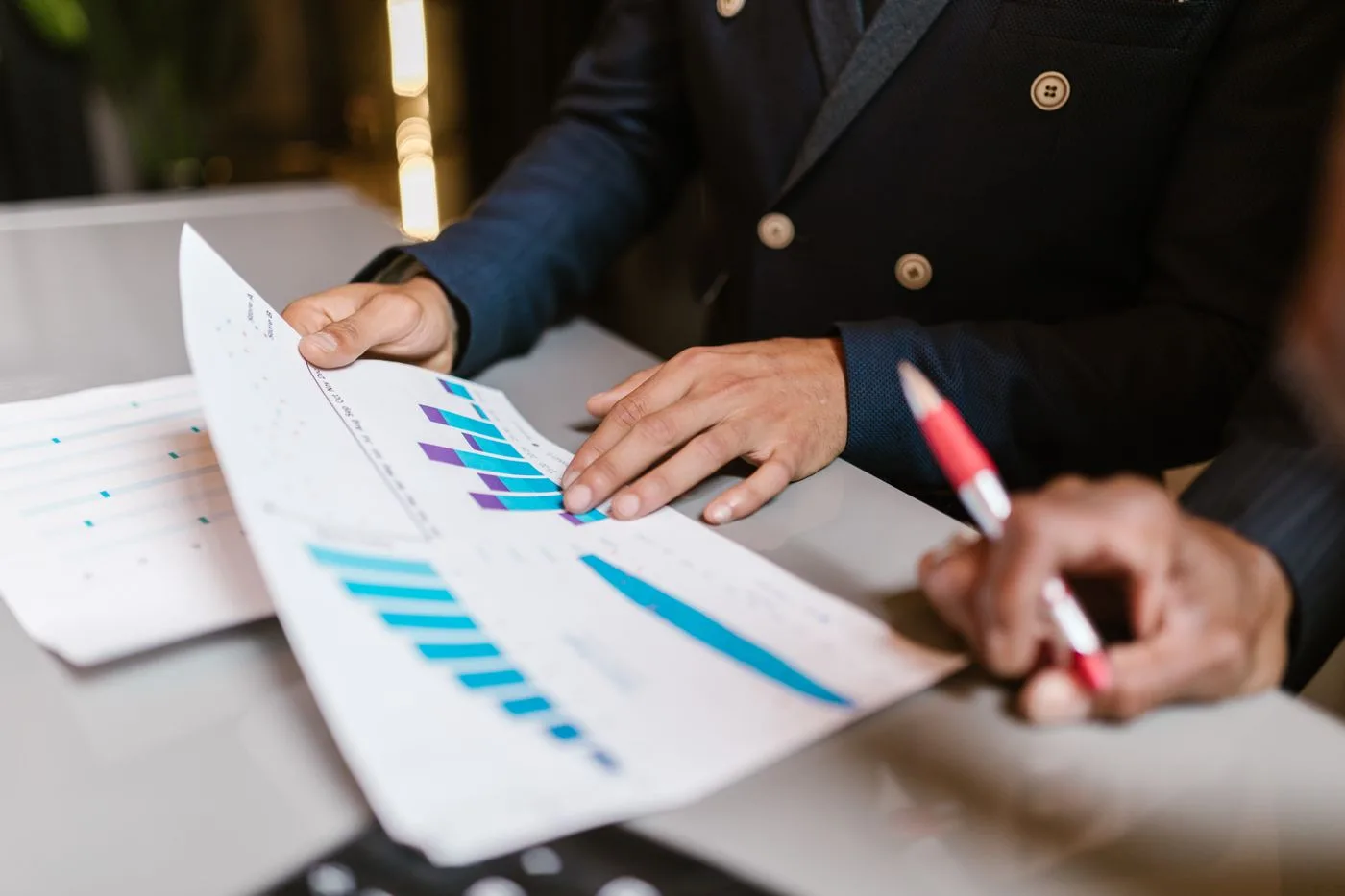Professionals reviewing financial charts together